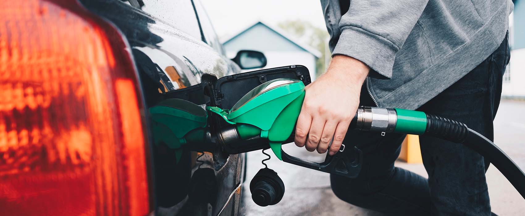  refueling car at gas station