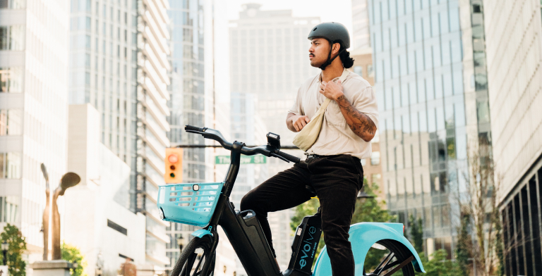 Evo Multi-Modal Man on a Bike in Vancouver