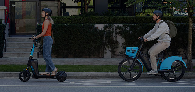 University friends riding an Evolve e-bike and an e-scooter